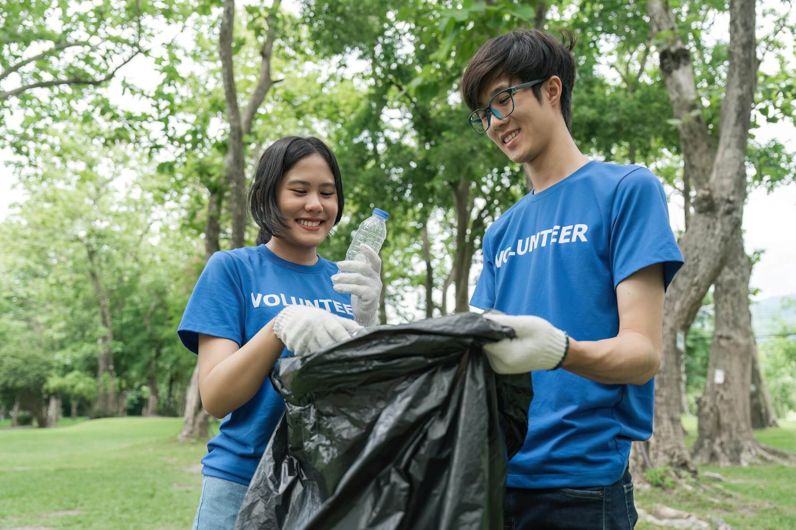volunteering-charity-cleaning-young-and-ecology-concept-group-of-happy-volunteers-with-garbage.jpg